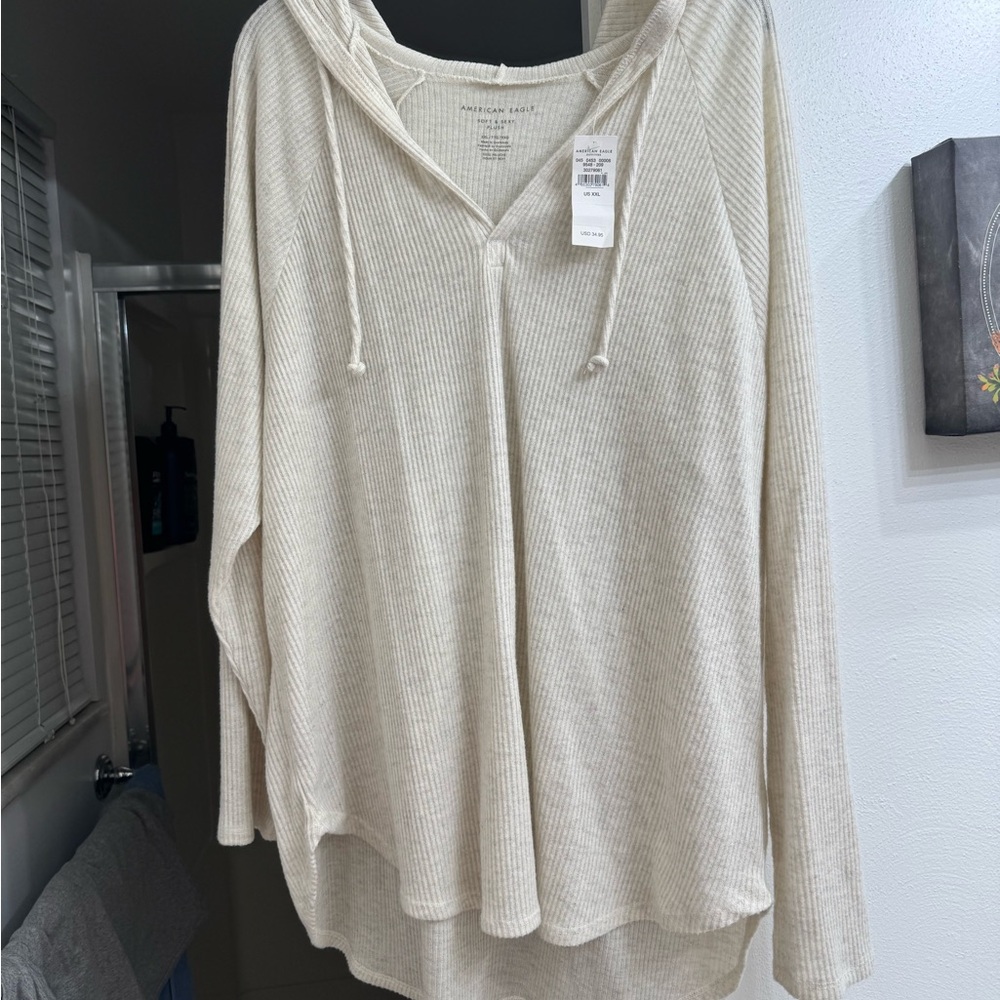 American Eagle Outfitters Cream Ribbed sweater this is oversized barely !!!